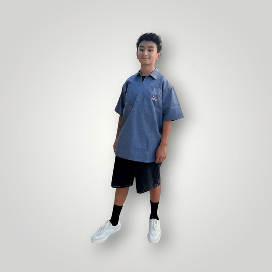 KA'EO Apparel short sleeve work shirt in charcoal heather with quarter-zip and embroidered graphic on chest pocket.