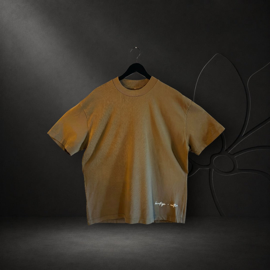 KA'EO Apparel olive oversized heavyweight cotton t-shirt with embroidered heritage + culture detail on the hem.