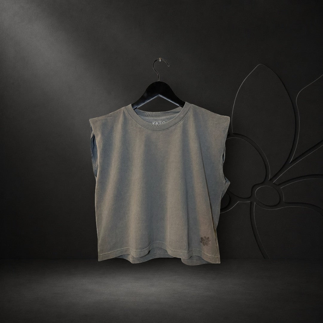 KA'EO Apparel women's faded black crew neck muscle tank top with padded shoulders and small sampaguita logo detail.