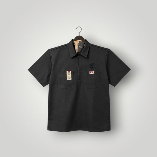 KA'EO Apparel black poly-cotton twill short sleeve work shirt with quarter-zip and two chest pockets.