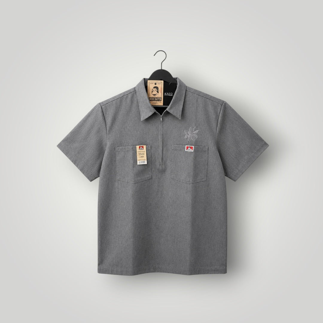 KA'EO Apparel x Ben Davis charcoal heather short sleeve work shirt with quarter-zip and two chest pockets.