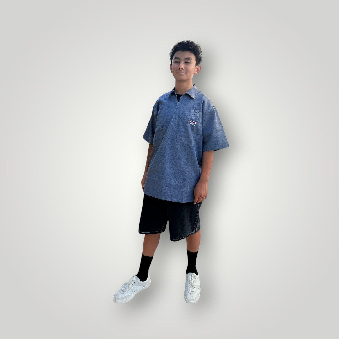 KA'EO Apparel short sleeve work shirt in charcoal heather with quarter-zip and embroidered graphic on chest pocket.