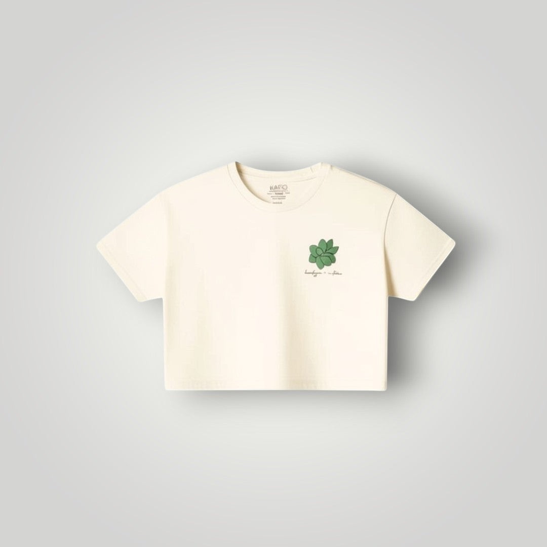 KA'EO Apparel cream cotton cropped t-shirt with olive green sampaguita graphic on chest.