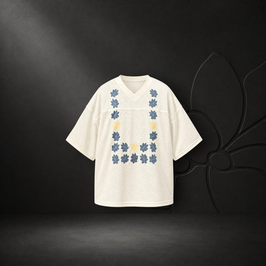 KA'EO Apparel cream mesh cropped football jersey with blue and yellow Sampaguita flower graphic in a U-shape design