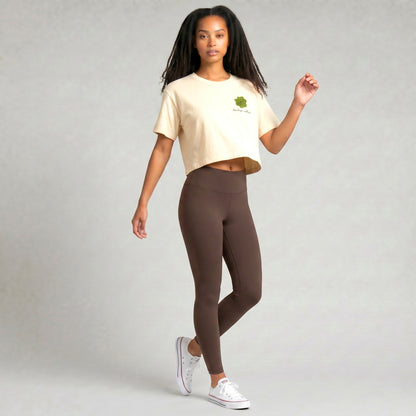 KA'EO Apparel cream cotton cropped t-shirt with olive green sampaguita graphic on chest.