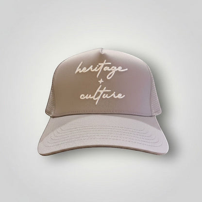 KA'EO Apparel gray cotton snapback cap with embroidered 'heritage + culture' text and curved brim.