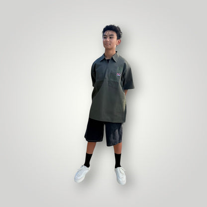 KA'EO Apparel olive drab short-sleeve work shirt with quarter-zip and embroidered logos on chest pockets.