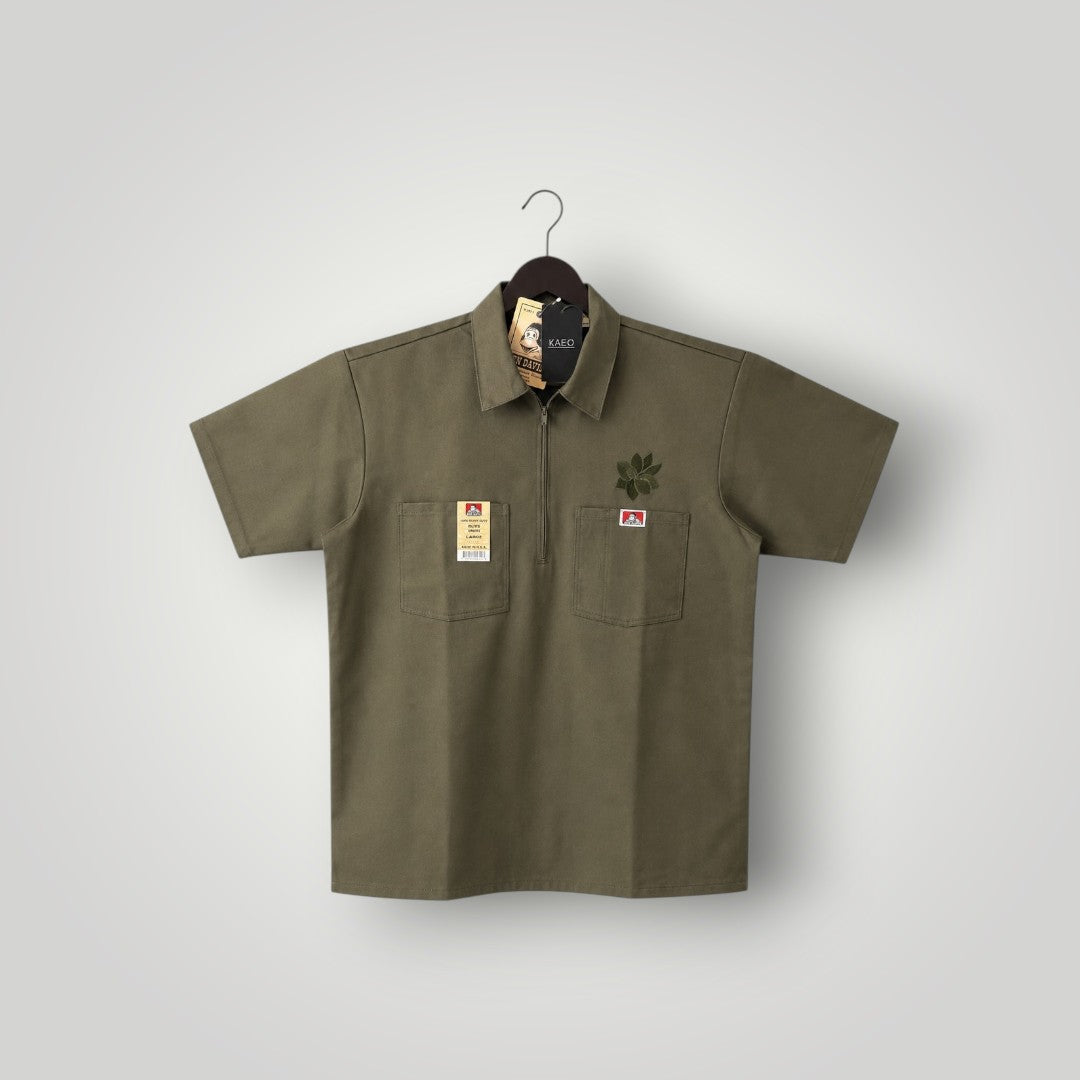 KA'EO Apparel olive drab short-sleeve work shirt with quarter-zip, two chest pockets, and embroidered logos.